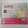 Back of puzzle box. Pastel colored butterflies with an inset of male photo and some descriptive text.