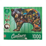 Cover of puzzle box, shades of green around black bear with full-color senes of wildlife wtithin the bear shape.