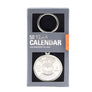 Silver calendar key ring in its gray packaging box. 50-year calendar with al of the numbers, months, years and sun and moon showing through