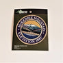 Single patch with a navy circle border and white embroidered text reading McKENZIE MOUNTAIN ELEVATION 3861, with mountain scene embroidered in circle in a circle.