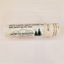 Tube of Northwoods paw balm on its side on a white background. The Northwoods logo is seen below a list of ingredients.