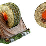 Side view of tent with feet sticking out coaster holder with faux bark coasters nestled inside. On the right just the faux-bark coaster with the campfire center in full view.
