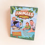 Back of the World of Animals Matching Game box with a sample card and two people playing the game.