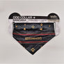 Dog collar bandana lying flat on its black and white packaging. An Aztec-like design with red triangles borders the yellow lettering ADIRONDACKS. The bottom triangle has a gold paw print centered on the black/gray design. The top rectangle has gold paw prints of various animals scattered through the black/gray design.