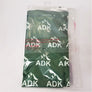 Green neck gaiter folded into rectangle in clear plastic packaging.