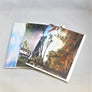 Three Barry Lobdell Adirondack photo cards fanned with Early on Baker card on top