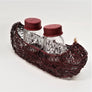 Salt and Pepper Shakers in Canoe Caddy