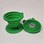 Green coffee funnel open on left; closed flat on right