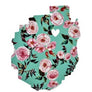 Single aqua floral patterned decal in shape of Adirondack Park with white heart in top third slightly off center, on a white background.