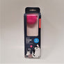 Hot pink toy puff seen through the clear window of the black box it is packaged in. Bottom of box has an illustration of a black and white cat looking at the fuzz ball while a hand holds the phone that it is attached to. White text on black type over the illustration to the left. A blue circle with the words: Fits All Phones! is above the cat.