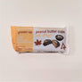 Yellow and white package of Milk Chocolate Barkeater chocolates peanut butter cups with maple.