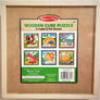 Back of the wooden cube puzzle board with a full-color graphic of all 6 puzzles featured in squares.