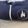 Close up of top navy hoodie folded to see the white Eagle Island logo close on the right side.