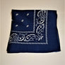 Workman's navy blue bandana folded square with paisley white print around corner edge