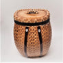 Pack basket ceramic cookie car with faux-basket weave and brown straps.