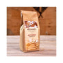 Packaged Bechard's Buttermilk Pancake mix stands upright on a wooden table