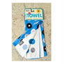 Blue Skoy dishtowel flipped back to show that it is reversible--white on the inside with blue colored circles.