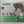 Back of puzzle box. Smaller picture of bear puzzle with descriptive copy and a photo of a female.