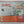 Back of puzzle box with soft pastel tractor images, a male photo and soem descriptive text.