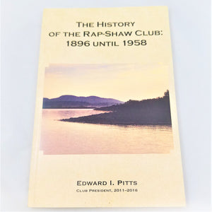 Cover of The History of the Rap-Shaw SLub: 1896 until 1958--text appears above a mountain and water landscape photo in the middle. The author's name and attribution are below: Edward I. Pitts, Club President, 2011-2016