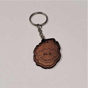 Single leather key chain with 46-R ADIRONDACK in brown lettering curved below a mountain range, all within the park outline, attached to a silver chain and keyring.