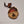 Single Adirondack Park-shaped wood/fabric ornament on a white background. Red plaid fabric shows through the top half with ADIRONDACK etched above the image of an Adirondack chair in the bottom center.