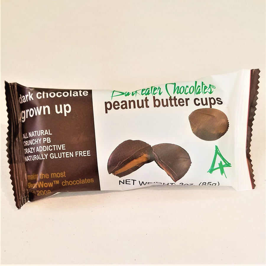Brown and white package of Dark Chocolate Barkeater chocolates peanut butter cups.