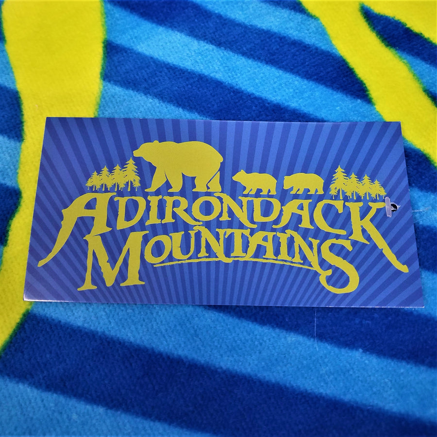 Dark blue, light blue and yellow stripes with rectangular patch of bears and mountains silhouette in gold