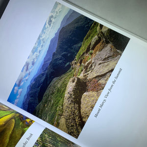 Photo from book displayed on the diagonal. A view of Mount Marcy from the Summit