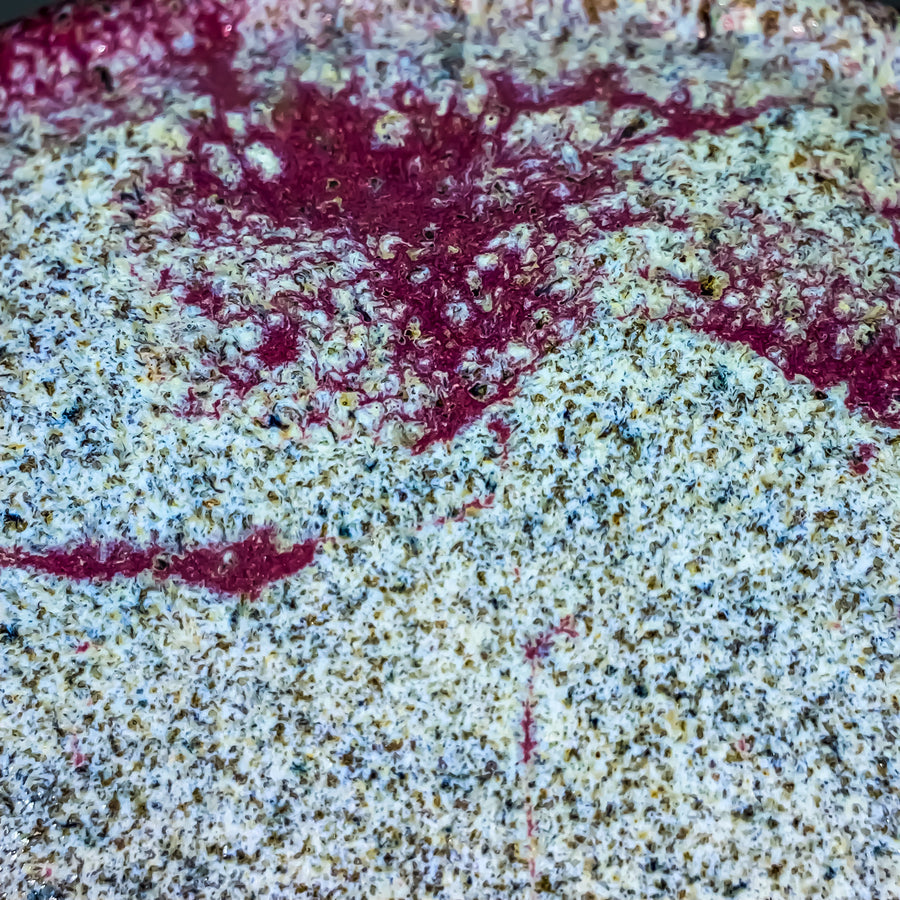 Close-up of bowl glaze--deep rose with pale green speckle