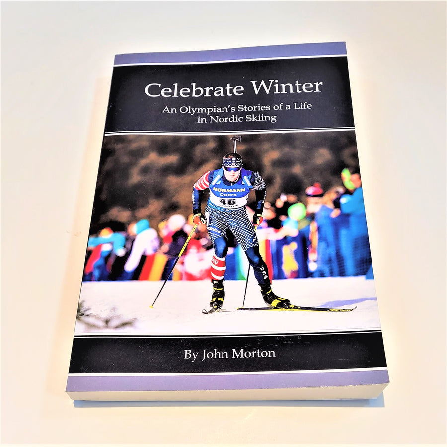 Cover of book Celebrate Winter with title text in white on a black band above the photo of Skier 46 in competition with a crowd of people blurred behind him.