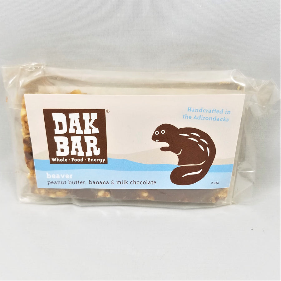 The front of the beaver Dak bar. The packaging describes if as peanut butter, banana, and milk chocolate.