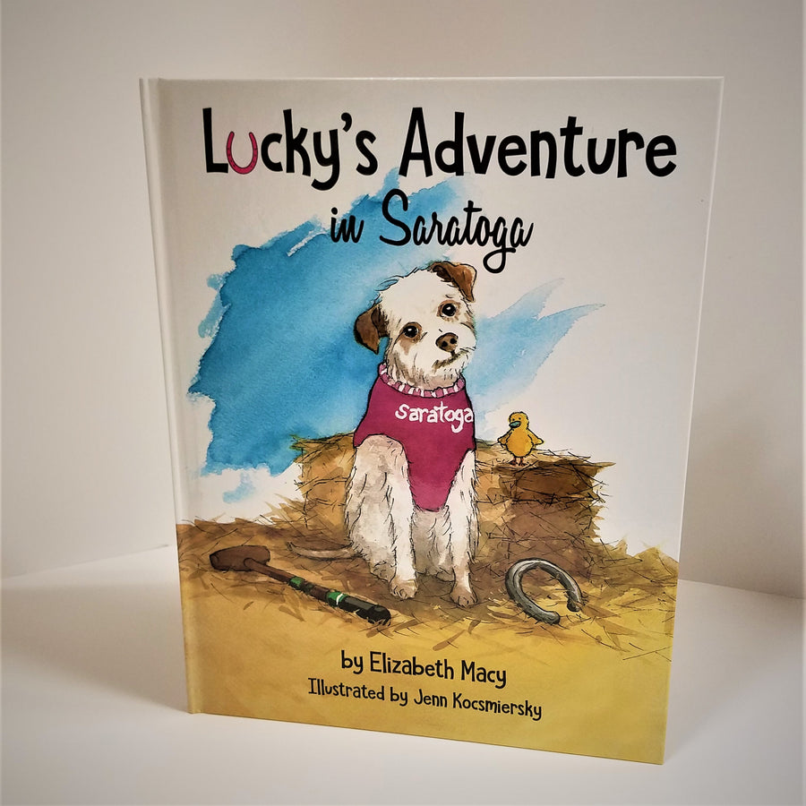 Cover of hardcover book Lucky's Adventure in Saratoga. Dog in Saratoga garb next to a chick on a haystack depicted in center of book cover.