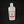 Single bottle of Rustic Cedar Goat Milk Lotion standing straight up. White liquid can be seen through clear plastic around the rectangular label in the center. The label has a rust-colored border with the black tree and goat logo in the center. Above the logo is the text Rustic Cedar Goat Milk Lotion and below in script Lemongrass & Rosemary with 8 fl.oz. /236 ml below that.