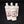 Five clear plastic bottles of various scents of Rustic Cedar Goat Milk Lotion grouped together on a black background. The lotion shows white through the bottle around the rust-bordered label in the center of the bottle. The label features the black logo in the center with two goats on either side of a tree. Over top is the text Rustic Cedar Goat Milk Lotion and below the logo the name of the scent. The two up front are Rosemary & Pepperment and Orange & Clove
