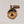 Single Adirondack Park-shaped wood/fabric ornament on a white background. Black plaid fabric shows through the top half with SARANAC LAKE etched above the image of an Adirondack chair in the bottom center.