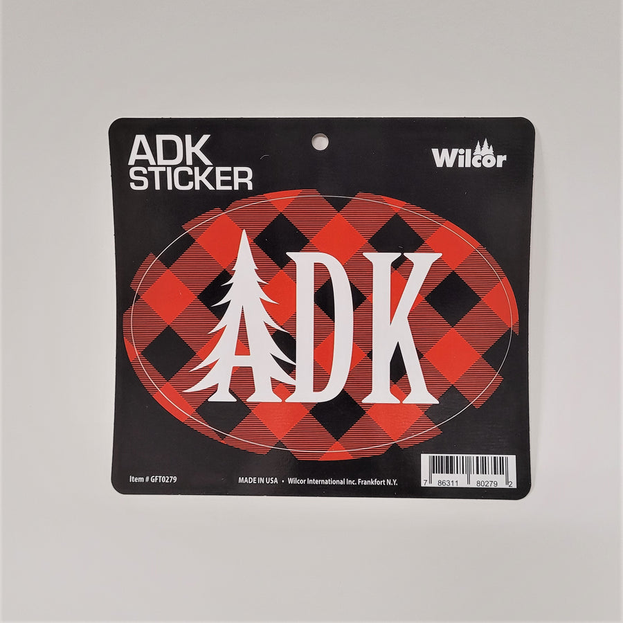 Buffalo plaid oval sticker in its card pacaking. White type in center ADK with the A shaped like an evergreen.
