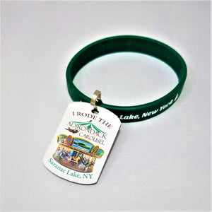 wristband and attached Adirondack Carousel zipper pull featuring the carousel itself