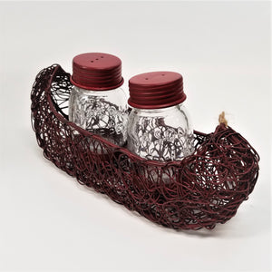 Salt and Pepper Shakers in Canoe Caddy