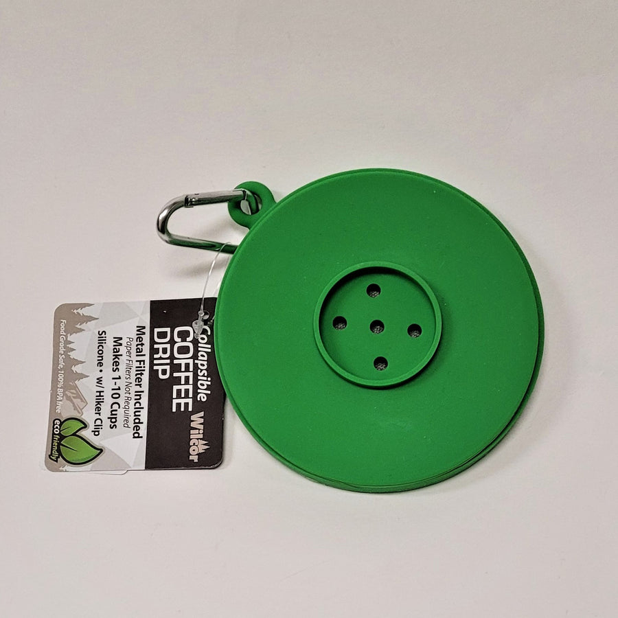 Circular green coffee funnel closed with carabiner on top left.