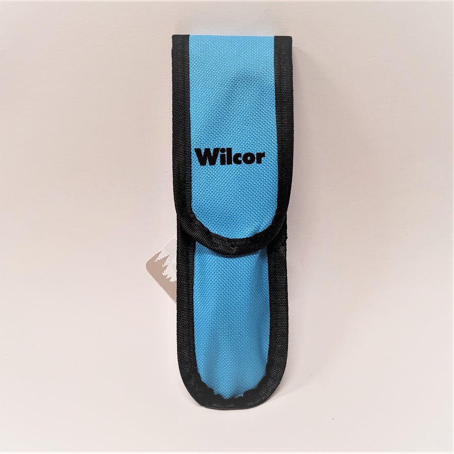 Closed blue pouch with black trim and Wilcor printed in black on the front.