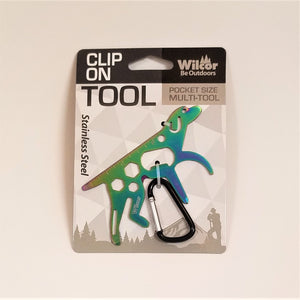 Clip-on Dog Tool in packaging. Stainless steel dog appears with a greenish center and blue front legs above the black and silver carabiner clip.