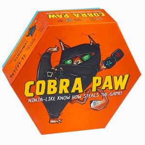Cover of Cobra Paw hexagon-shaped orange box with black-suited creature in the center with green eyes peering out.