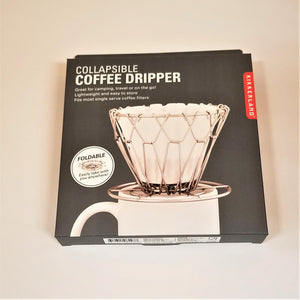 Collapsible coffee dripper in its boxed packaging with picture of metal frame and paper coffee filter on top of a mug.