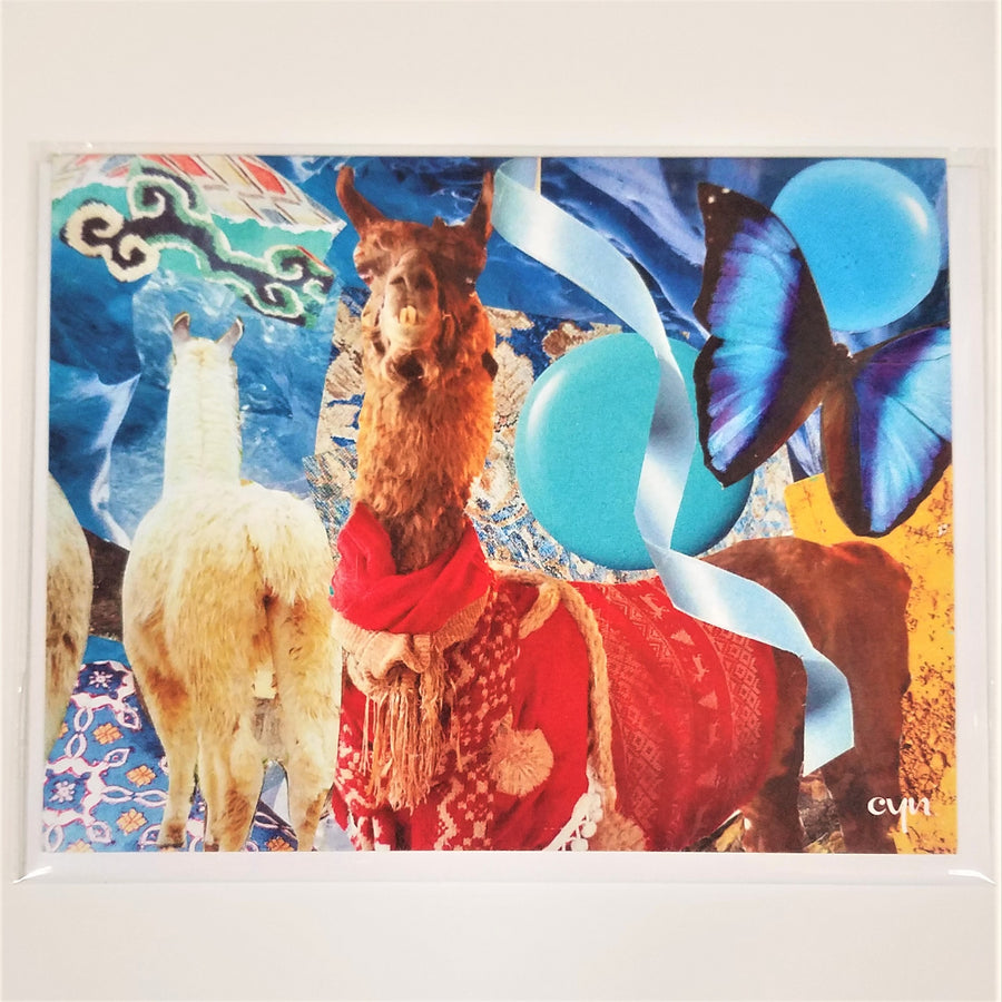 Bright red on a brown llama facing forward, the back of a white llama, deep blue butterfly, light blue circles, and light blue ribbon, other blue and green patterns in this art collage card.