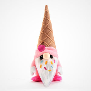 Single ice cream cone-topped gnome standing in a white background. Pink trim on hat has a pink apple attached. There are multi-colored sprinkles in the white beard. A pink body can be seen around the beard. White hands and deep pink feet.