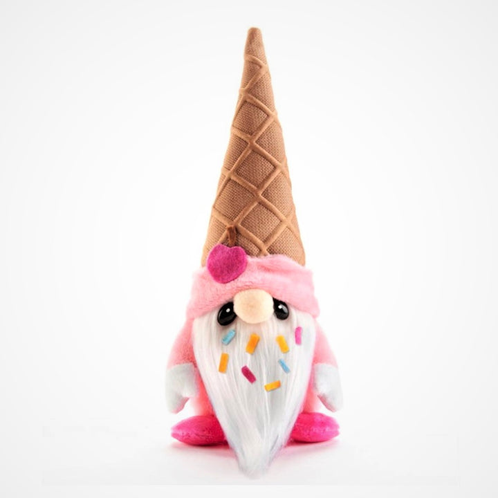Single ice cream cone-topped gnome standing in a white background. Pink trim on hat has a pink apple attached. There are multi-colored sprinkles in the white beard. A pink body can be seen around the beard. White hands and deep pink feet.