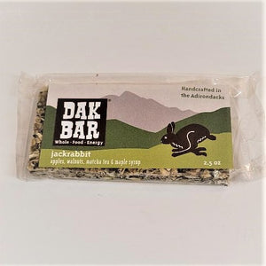 The jackrabbit Dak lying flat with some of the bar peeking through the bottom and left side of the packaging.