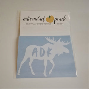 Decal of moose in white with lettering ADK on body of moose.