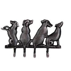 Four distinct metal dogs atop the hook tails positioned with hooks out